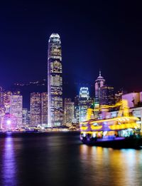 Illuminated buildings at waterfront