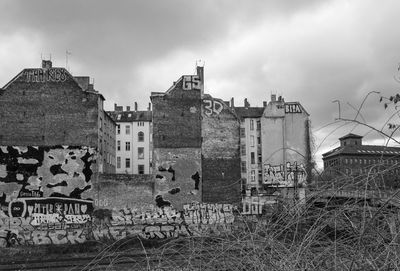 Old buildings against sky