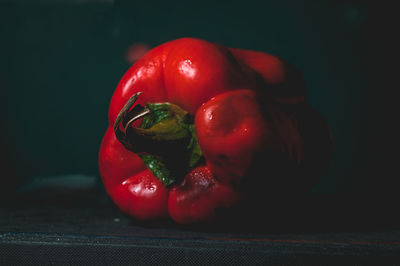 Close-up of red bell peppers on table