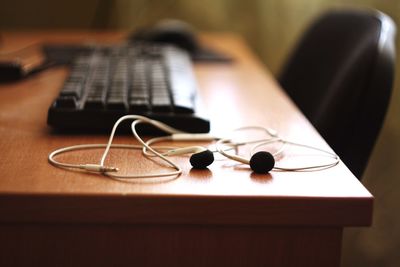 Extreme close up of headphones at home office