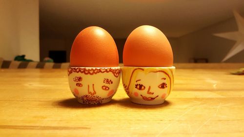 Close-up of toy on wooden wall