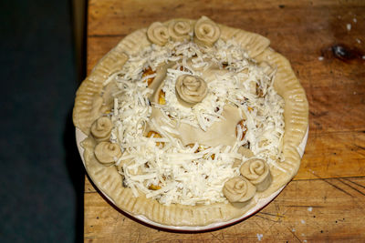 High angle view of bread on cutting board