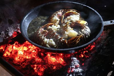 Close-up of food cooking on fire