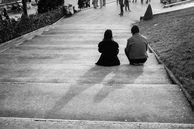 Rear view of couple walking outdoors