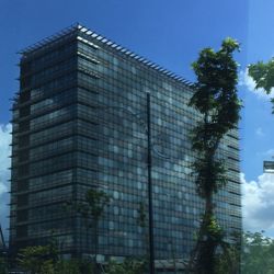 Low angle view of building against clear blue sky