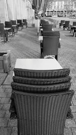 Chairs and table on sidewalk