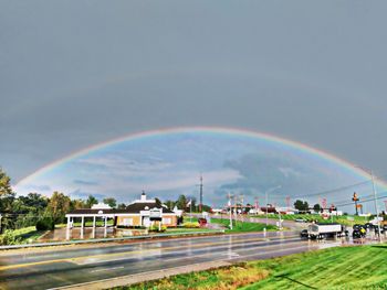 Rainbow over city