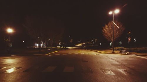 Street lights on road at night