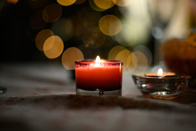 Close-up of lit tea light candles