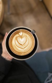 Close-up of cappuccino on table