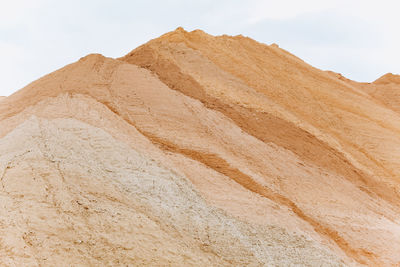 Low angle view of desert against sky