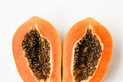 Close-up of oranges against white background