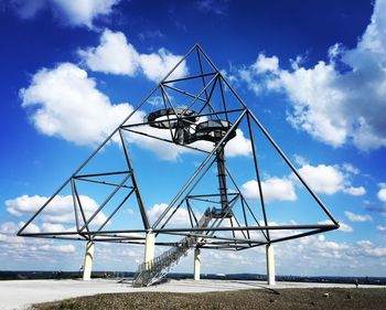 Metallic structure against sky