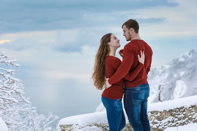 Full length of man standing on snow