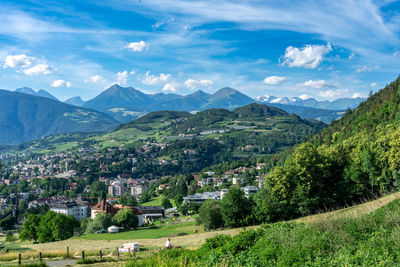 High angle view of trees and mountains against sky