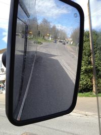 Road seen through train windshield