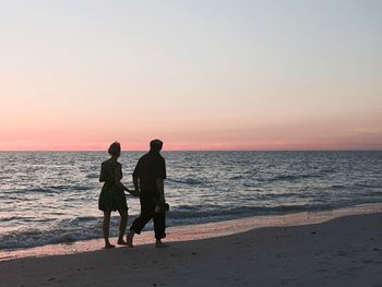 Scenic view of sea at sunset