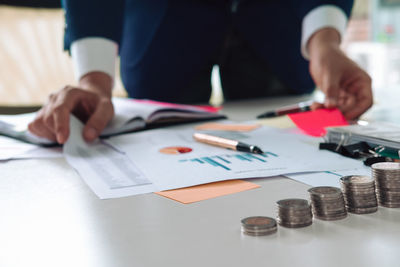 Close-up of man working on table
