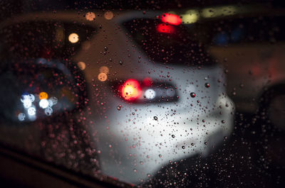 Close-up of wet car window