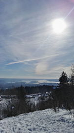 Scenic view of sea against sky during winter