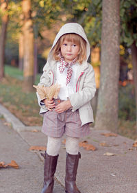 Portrait of girl standing in autumn