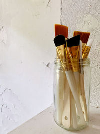 High angle view of paintbrushes on table