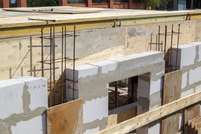 Abandoned building by construction site