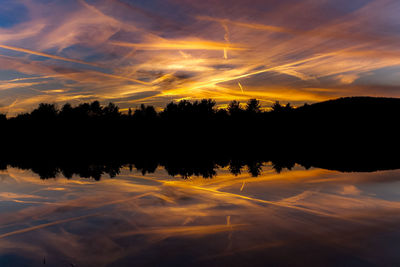 Scenic view of silhouette landscape against sky during sunset