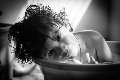 Portrait of cute girl in bathroom at home