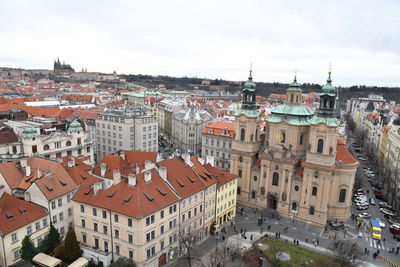 High angle view of buildings in city against sky