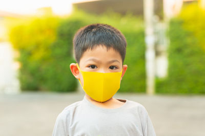 Portrait of boy with yellow hat