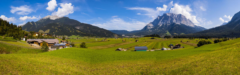 Panoramic view of tiroler zugspitz arena with zugspitze mountain in background