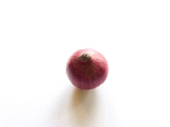 Close-up of apple against white background