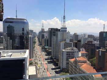 High angle view of buildings in city against sky