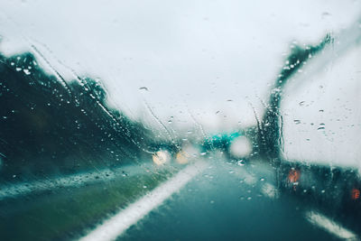 Wet glass window in rainy season