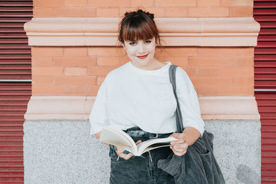 Young woman using mobile phone