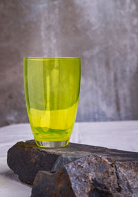 Close-up of yellow drink on table