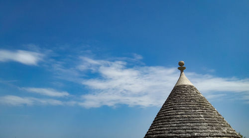 Low angle view of temple against blue sky