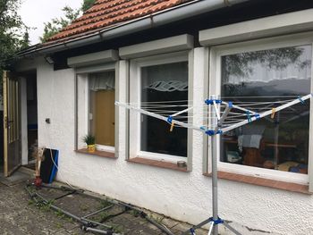 Building seen through window of house