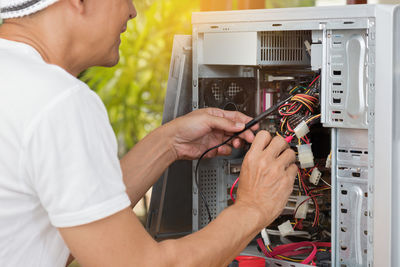 Man repairing computer