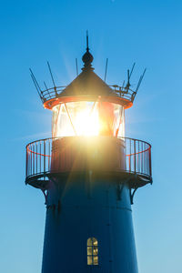 Low angle view of lighthouse against clear sky