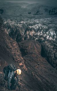 Scenic view of sea by mountain