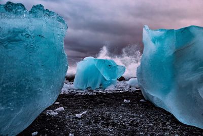 Scenic view of frozen sea against sky