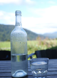 Close-up of water bottle on table
