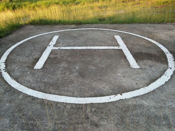 High angle view of information sign on road