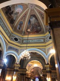 Low angle view of illuminated ceiling in building