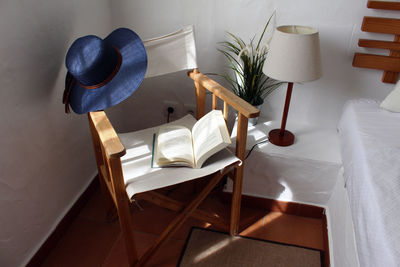 High angle view of chairs on table at home