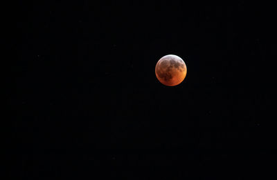 Scenic view of moon against sky at night