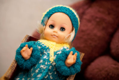 Close-up portrait of cute baby girl in snow