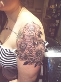 Midsection of woman holding flowers